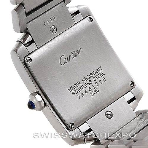 The image shows the back case of a Cartier Tank Francaise W51011Q3 Women's Stainless Steel Silver Dial W51011Q3 Women's Stainless Steel Silver Dial watch, highlighting its water resistance and stainless steel details.