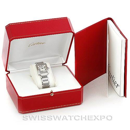 This image shows a Cartier Tank Francaise W51011Q3 Women's Stainless Steel Silver Dial W51011Q3 Women's Stainless Steel Silver Dial watch in its open red box alongside Cartier documentation.