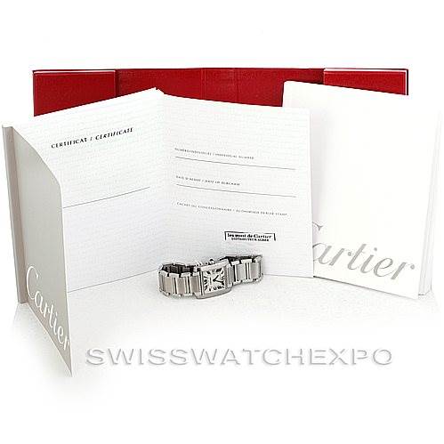 The image shows a Cartier Tank Francaise W51011Q3 Women's Stainless Steel Silver Dial W51011Q3 Women's Stainless Steel Silver Dial watch with its box, certificates, and documentation laid out.