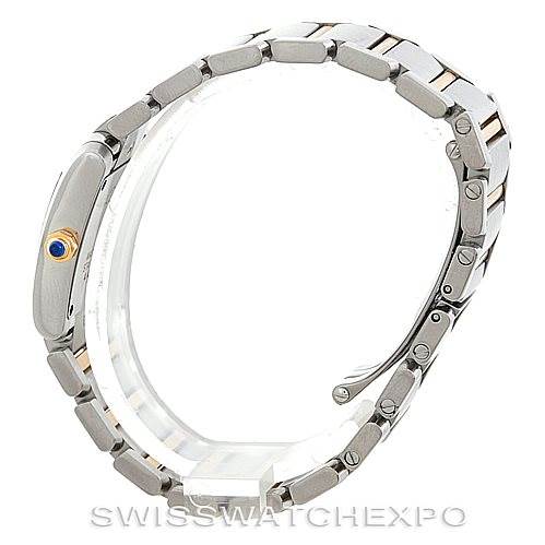 This image shows a Cartier Tank Francaise W51007Q4 Women's Steel and Gold (two tone) Silver Dial W51007Q4 Women's Steel and Gold (two tone) Silver Dial watch from a side angle, highlighting its bracelet and crown.