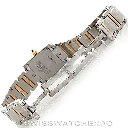 The image shows the back and bracelet of a Cartier Tank Française watch, highlighting the two-tone metal links and clasp.