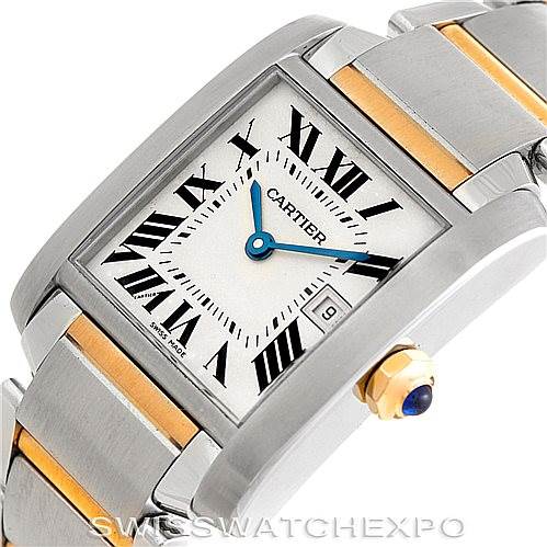 The Cartier Tank Francaise W51012Q4 Women's Steel and Gold (two tone) Silver Dial W51012Q4 Women's Steel and Gold (two tone) Silver Dial watch is shown at an angle, highlighting its square dial, blue hands, Roman numerals, and two-tone metal bracelet.