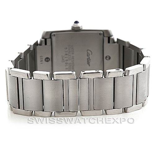 This image shows the back of the Cartier Tank Française watch, highlighting its case back and metal bracelet.