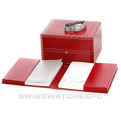 The image shows a Cartier Tank Francaise W51008Q3 Women's Stainless Steel Silver Dial W51008Q3 Women's Stainless Steel Silver Dial watch atop a red box, alongside accompanying booklets and documents.