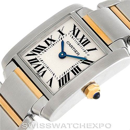 The image shows a close-up of the Cartier Tank Francaise W51007Q4 Steel and Gold (two tone) Silver Dial W51007Q4 Steel and Gold (two tone) Silver Dial watch, highlighting the dial, Roman numerals, and the bracelet with gold accents.