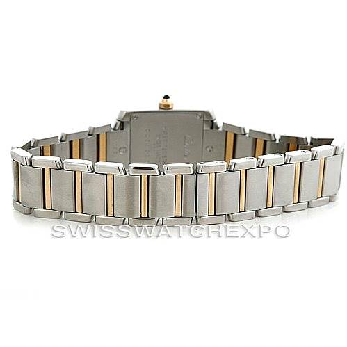 The image shows the back view of a Tank Francaise watch by Cartier, focusing on the metal bracelet and clasp.