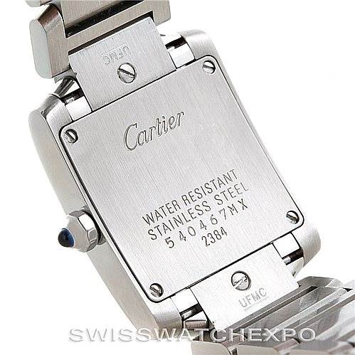 The image shows the backside of a Cartier Tank Française watch, highlighting the water-resistant stainless steel case and serial numbers.