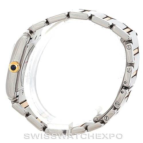 The image shows a side view of the Cartier Tank Française watch, highlighting the stainless steel bracelet and winder.