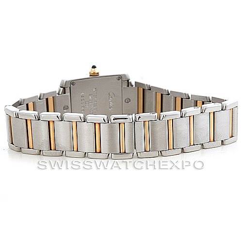 This image shows the rear angle of the Tank Française model by Cartier, focusing on the two-tone metal bracelet and clasp.