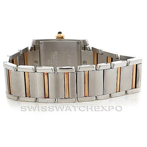 This image shows the back view of a Tank Francaise model by Cartier, showcasing its two-tone metal bracelet and case back.