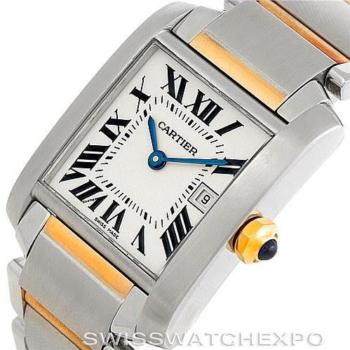 This image shows a close-up of the dial and part of the bracelet of a Cartier Tank Française watch.