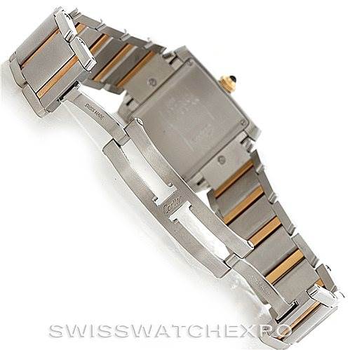 This image shows the back and the clasp of a Cartier Tank Française watch, highlighting the metal band and deployment clasp.