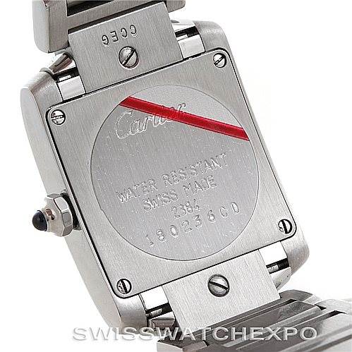 This image shows the back of a Cartier Tank Française watch, detailing the case back and bracelet attachment.