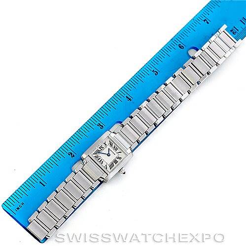 This image shows a Cartier Tank Francaise W51008Q3 Women's Stainless Steel Silver Dial W51008Q3 Women's Stainless Steel Silver Dial model watch placed alongside a blue ruler, displaying its face and bracelet in a top-down angle.