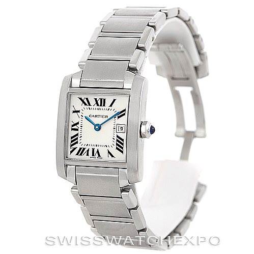 The Tank Francaise by Cartier is shown at a three-quarter angle, displaying its rectangular dial, Roman numerals, and metal bracelet.