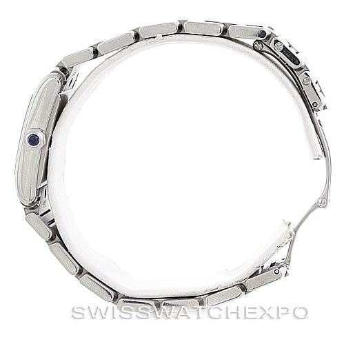 The image shows a side view of a Cartier Tank Francaise W51011Q3 Women's Stainless Steel Silver Dial W51011Q3 Women's Stainless Steel Silver Dial watch, focusing on the bracelet and crown with a sapphire cabochon.