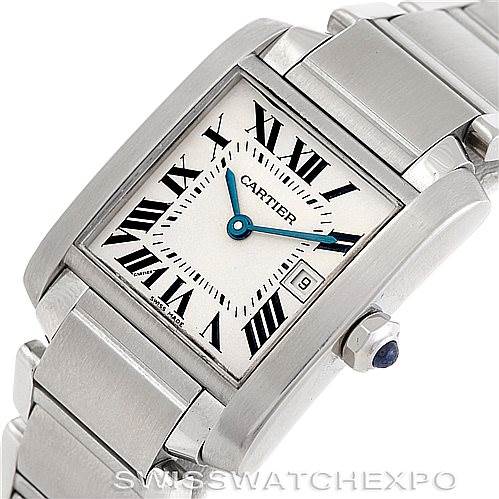 This image shows a close-up view of the Cartier Tank Française watch, highlighting its face, Roman numerals, and part of the metal bracelet.