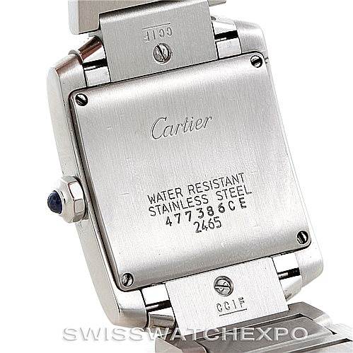 The image shows the back case of a Cartier Tank Francaise W51011Q3 Women's Stainless Steel Silver Dial W51011Q3 Women's Stainless Steel Silver Dial watch, highlighting its water resistance, stainless steel material, and serial number.