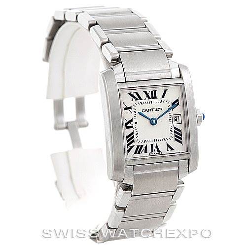 The image shows a Cartier Tank Française watch at a 3/4 angle, displaying the face, bezel, bracelet, and crown.