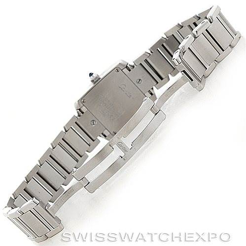 The image shows the back view of a Cartier Tank Française watch, highlighting its metal bracelet and clasp.