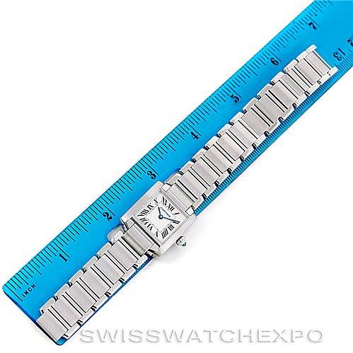 This image shows the Cartier Tank Française watch at a straight angle, alongside a ruler for measurement.