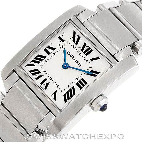 This image shows a close-up angle of the Cartier Tank Française watch, featuring its face, part of the bracelet, and winding crown.