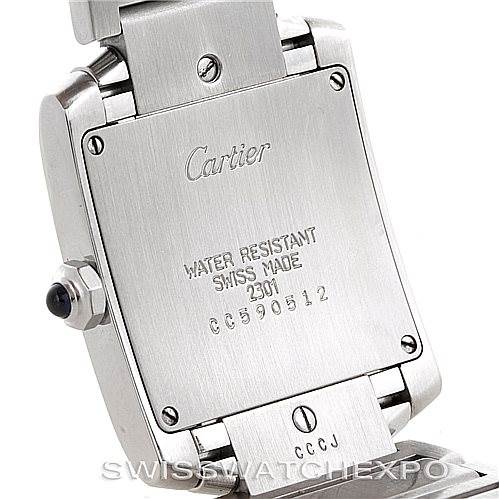 This image shows the back case of a Cartier Tank Française watch, highlighting its water resistance and serial number.