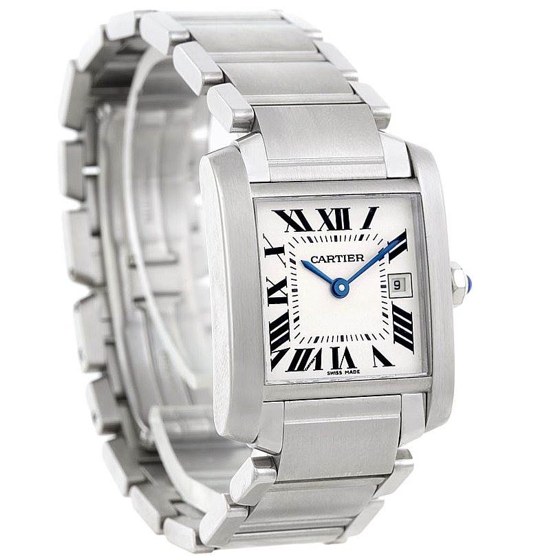 The image shows a Cartier Tank Française watch from a front angle, highlighting its rectangular face, Roman numerals, and metal bracelet.