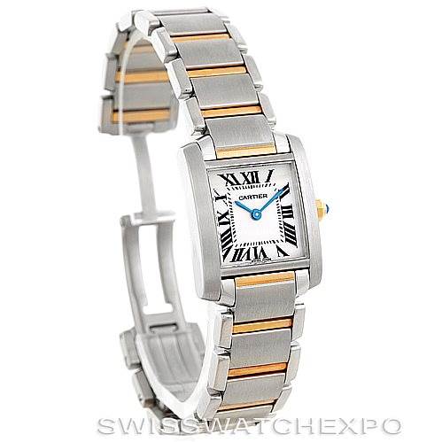 This image shows a Cartier Tank Francaise W51007Q4 Women's Steel and Gold (two tone) Silver Dial W51007Q4 Women's Steel and Gold (two tone) Silver Dial watch at a slight angle, highlighting its square face, bracelet, and the crown with a blue gem.