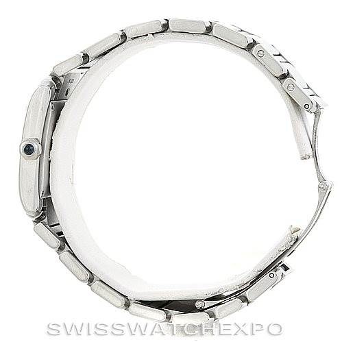 The image shows a side view of a Cartier Tank Française watch, highlighting its side profile and bracelet links.