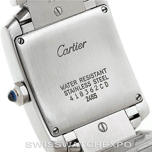 The image shows the back of a Cartier Tank Francaise W51011Q3 Women's Stainless Steel Silver Dial W51011Q3 Women's Stainless Steel Silver Dial watch, highlighting its stainless steel casing and water resistance details.
