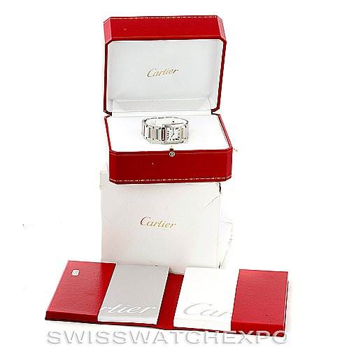 A Cartier Tank Francaise W51012Q4 Women's Steel and Gold (two tone) Silver Dial W51012Q4 Women's Steel and Gold (two tone) Silver Dial watch is displayed in an open red box, with accompanying packaging and booklets arranged below.