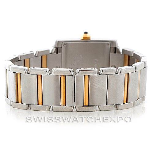 The image shows the back view of a Cartier Tank Francaise W51012Q4 Women's Steel and Gold (two tone) Silver Dial W51012Q4 Women's Steel and Gold (two tone) Silver Dial watch, focusing on its two-tone metal bracelet and clasp.