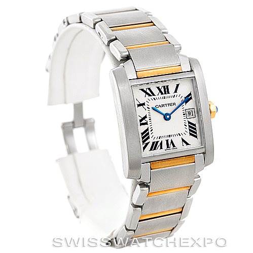 The image shows a Tank Française watch by Cartier at a slight side angle, highlighting its two-tone bracelet and square dial with Roman numerals.