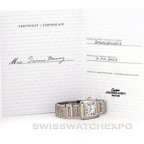 The image shows a Cartier Tank Française watch laid flat next to its certificate of authenticity.