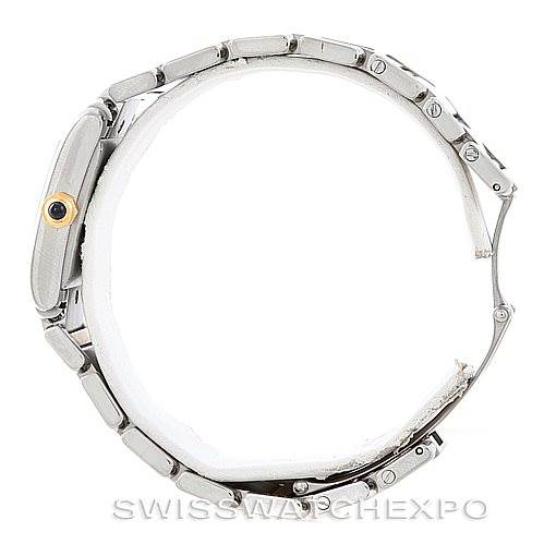 This image shows a side profile of a Cartier Tank Francaise W51012Q4 Women's Steel and Gold (two tone) Silver Dial W51012Q4 Women's Steel and Gold (two tone) Silver Dial watch, highlighting the metal bracelet and crown with a blue cabochon.