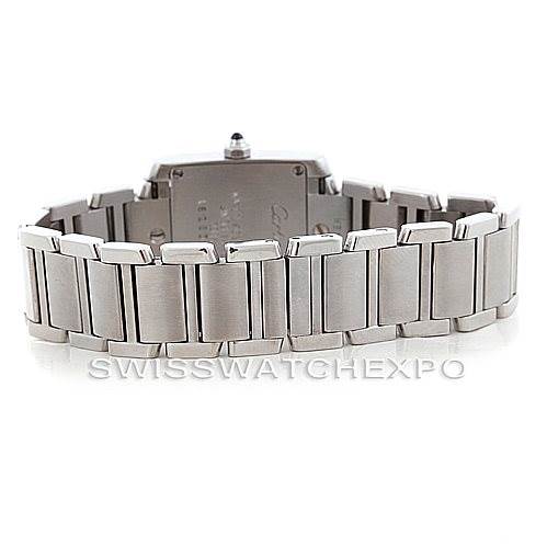 The image shows the back view of a Cartier Tank Francaise W51008Q3 Women's Stainless Steel Silver Dial W51008Q3 Women's Stainless Steel Silver Dial watch, focusing on its metal bracelet and case back.