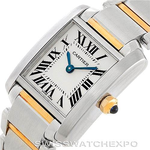 This image shows a close-up angle of the Cartier Tank Francaise W51007Q4 Women's Steel and Gold (two tone) Silver Dial W51007Q4 Women's Steel and Gold (two tone) Silver Dial watch face and part of the bracelet, highlighting the crown and Roman numerals.