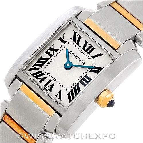 The image shows a close-up of the Cartier Tank Francaise W51007Q4 Women's Steel and Gold (two tone) Silver Dial W51007Q4 Women's Steel and Gold (two tone) Silver Dial watch, highlighting its dial, bracelet, and crown.