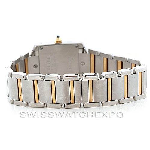 The image shows a rear view of the Tank Française model by Cartier, focusing on its two-tone stainless steel and gold bracelet.