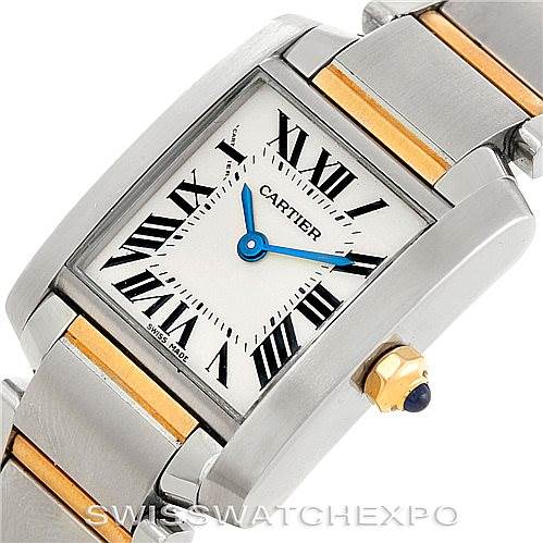 This image shows a close-up view of the Cartier Tank Francaise W51007Q4 Women's Steel and Gold (two tone) Silver Dial W51007Q4 Women's Steel and Gold (two tone) Silver Dial watch, highlighting the dial, blue hands, crown, and part of the bracelet.