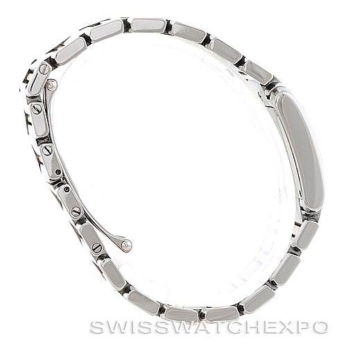 The image shows a Cartier Tank Francaise W51007Q4 Women's Steel and Gold (two tone) Silver Dial W51007Q4 Women's Steel and Gold (two tone) Silver Dial watch viewed from the side, focusing on the bracelet and clasp.