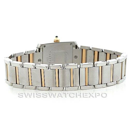 The image shows the back view of a Cartier Tank Francaise W51007Q4 Women's Steel and Gold (two tone) Silver Dial W51007Q4 Women's Steel and Gold (two tone) Silver Dial watch highlighting its stainless steel and gold bracelet.