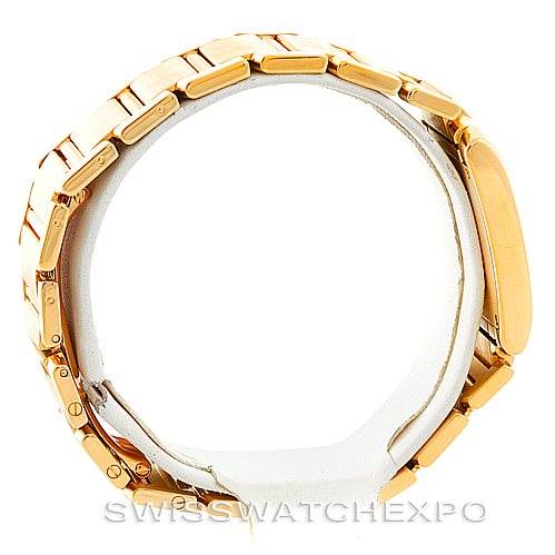 The image shows a side angle of the bracelet of a Cartier Tank Francaise W50003N2 Women's Yellow Gold Silver Dial W50003N2 Women's Yellow Gold Silver Dial watch.