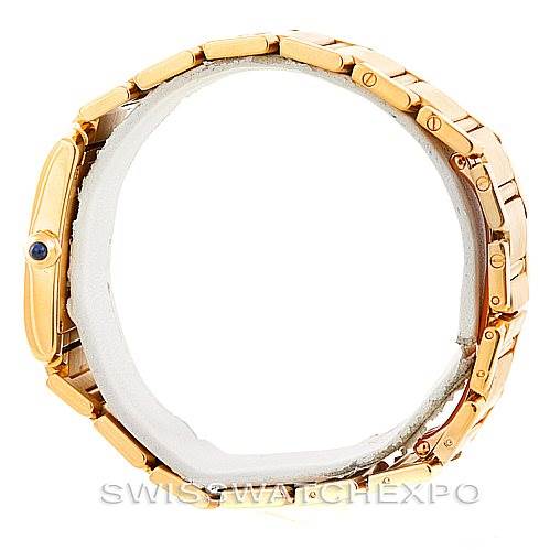 This image shows a side view of the Cartier Tank Française watch, focusing on the bracelet and crown with a blue cabochon.