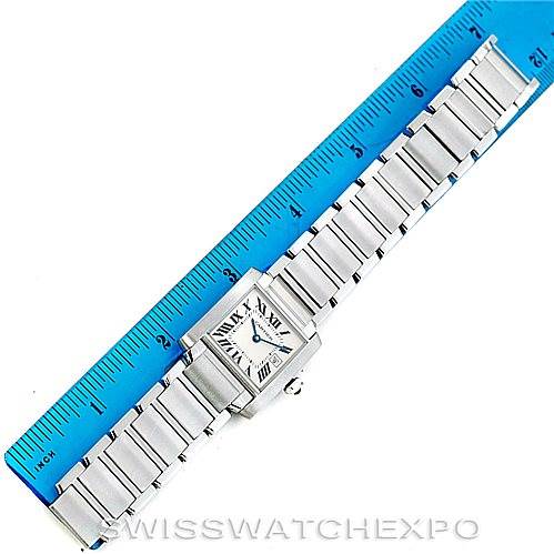 The image shows the Cartier Tank Francaise W51011Q3 Women's Stainless Steel Silver Dial W51011Q3 Women's Stainless Steel Silver Dial watch placed alongside a ruler, displaying its face and entire metal bracelet.