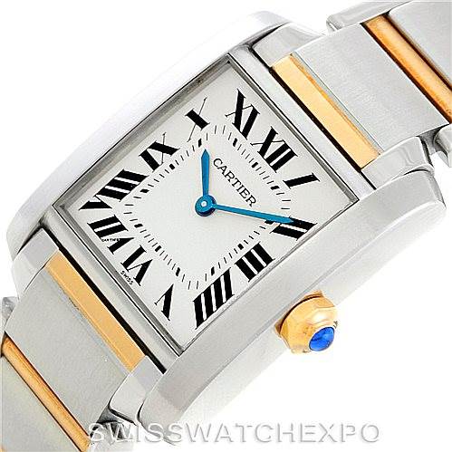 The image shows a close-up of the Cartier Tank Française watch angled to display its square dial, Roman numerals, and metal bracelet.