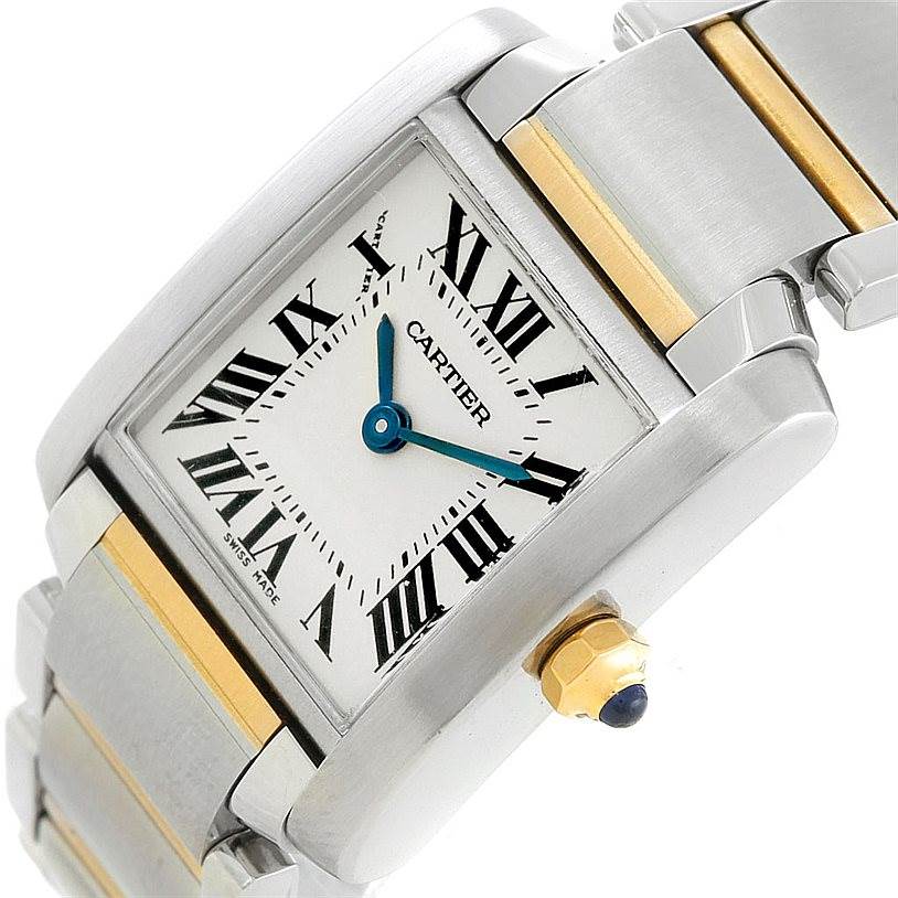 This image shows a close-up of the Cartier Tank Francaise W51007Q4 Women's Steel and Gold (two tone) Silver Dial W51007Q4 Women's Steel and Gold (two tone) Silver Dial watch, highlighting its dial, bracelet, and crown.