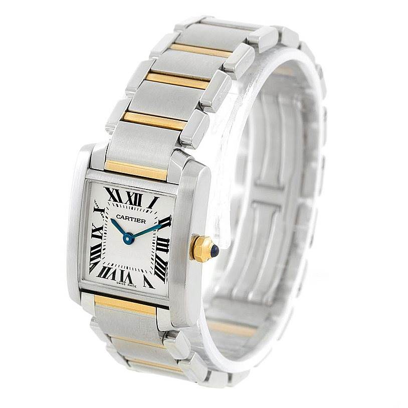 The image shows a Cartier Tank Française watch at a three-quarter angle, highlighting its stainless steel and gold bracelet, and rectangular dial.