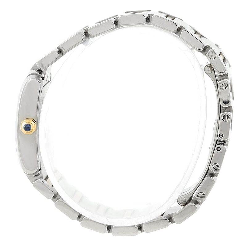 This side view of a Cartier Tank Française watch highlights the band and crown. 